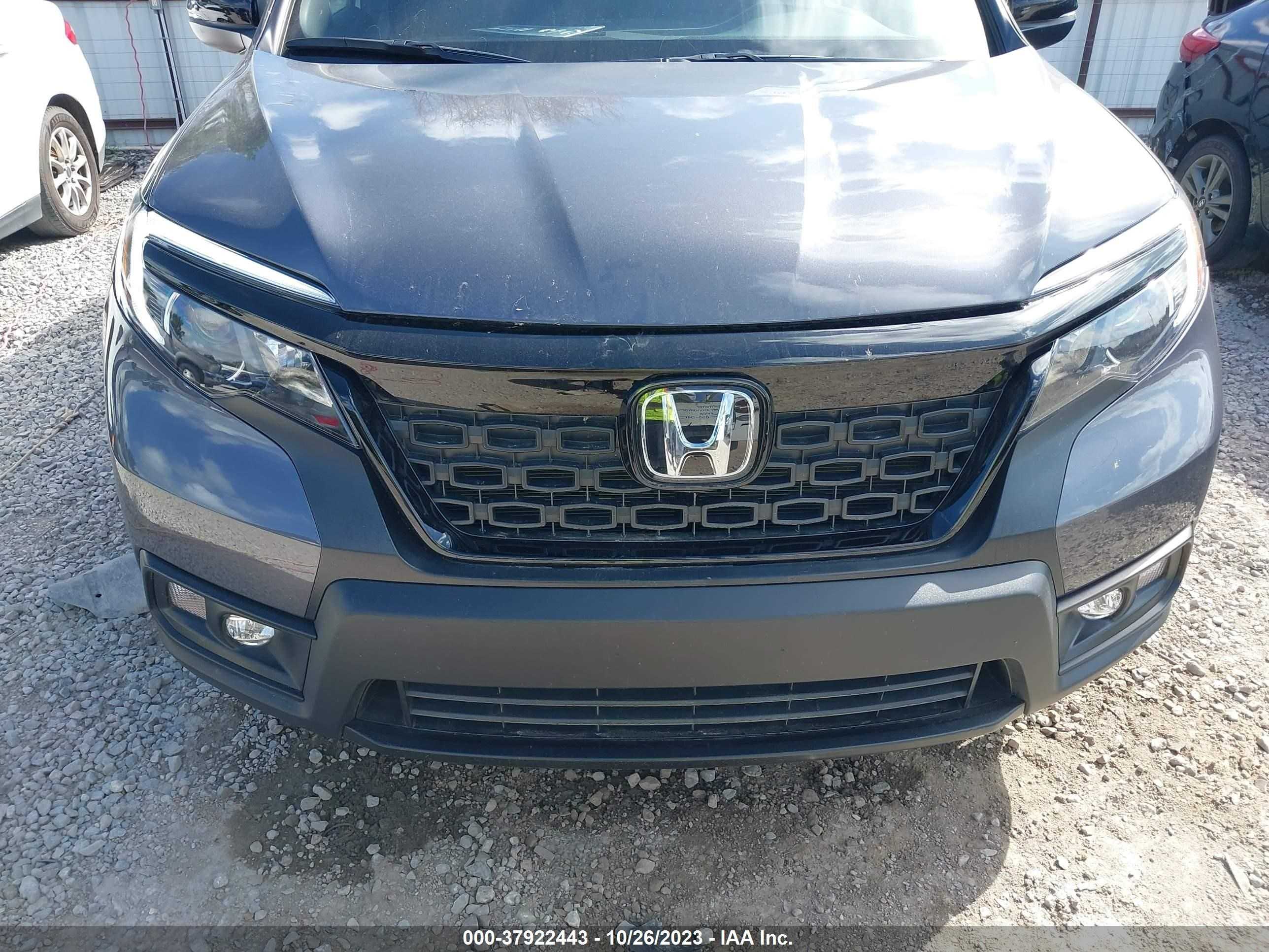 Photo 11 VIN: 5FNYF7H55KB009856 - HONDA PASSPORT 