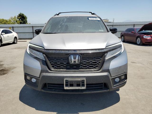 Photo 4 VIN: 5FNYF7H9XKB004168 - HONDA PASSPORT 