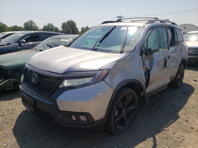 Photo 1 VIN: 5FNYF8H00KB019950 - HONDA PASSPORT E 