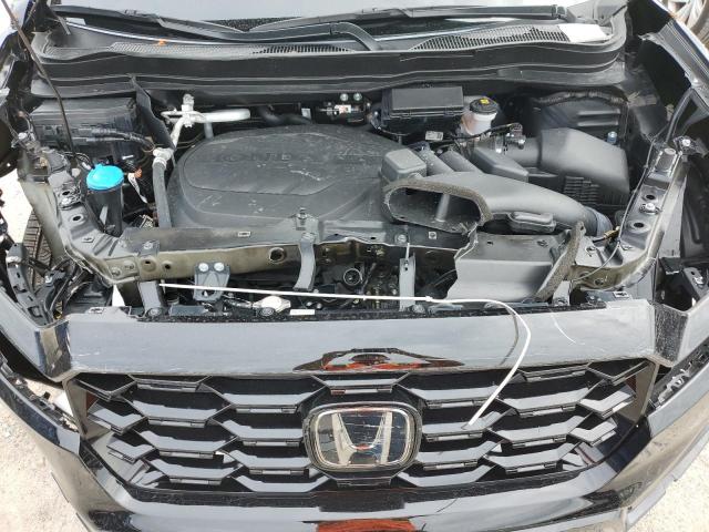 Photo 11 VIN: 5FNYF8H03PB017374 - HONDA PASSPORT E 