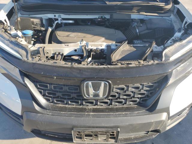 Photo 11 VIN: 5FNYF8H04MB014544 - HONDA PASSPORT E 