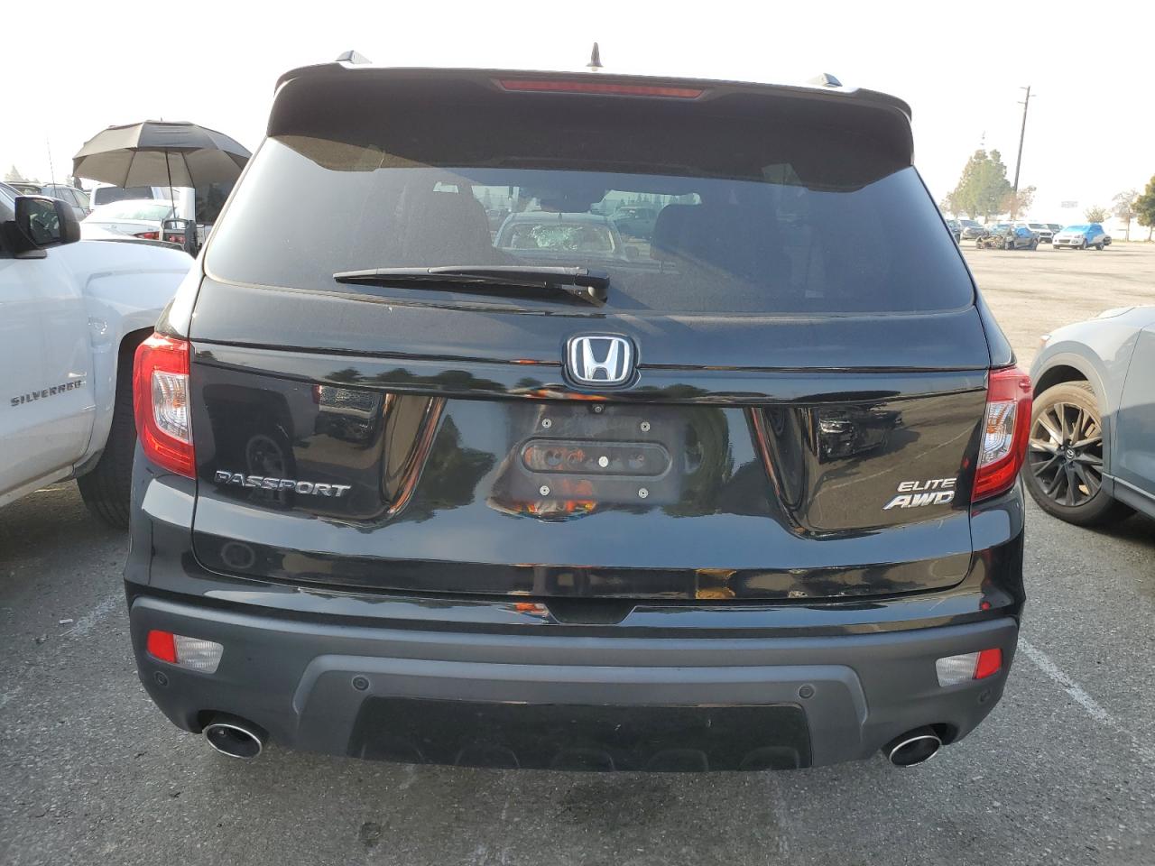 Photo 5 VIN: 5FNYF8H05KB014517 - HONDA PASSPORT 