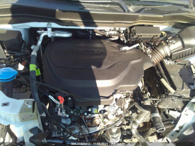 Photo 9 VIN: 5FNYF8H08MB003840 - HONDA PASSPORT 