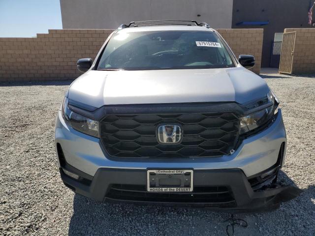 Photo 4 VIN: 5FNYF8H08NB024267 - HONDA PASSPORT E 