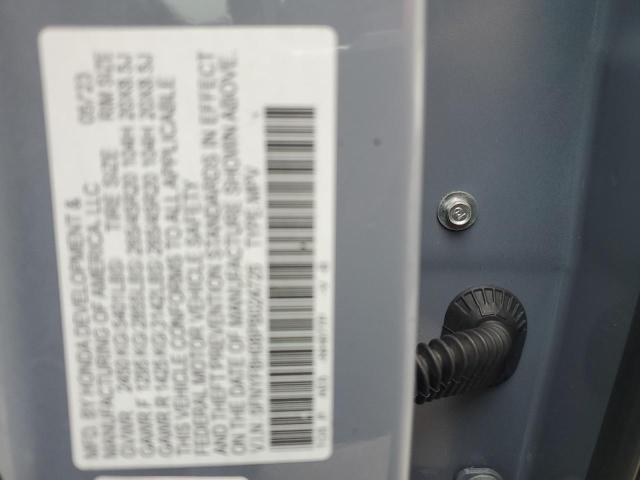 Photo 12 VIN: 5FNYF8H08PB024725 - HONDA PASSPORT E 