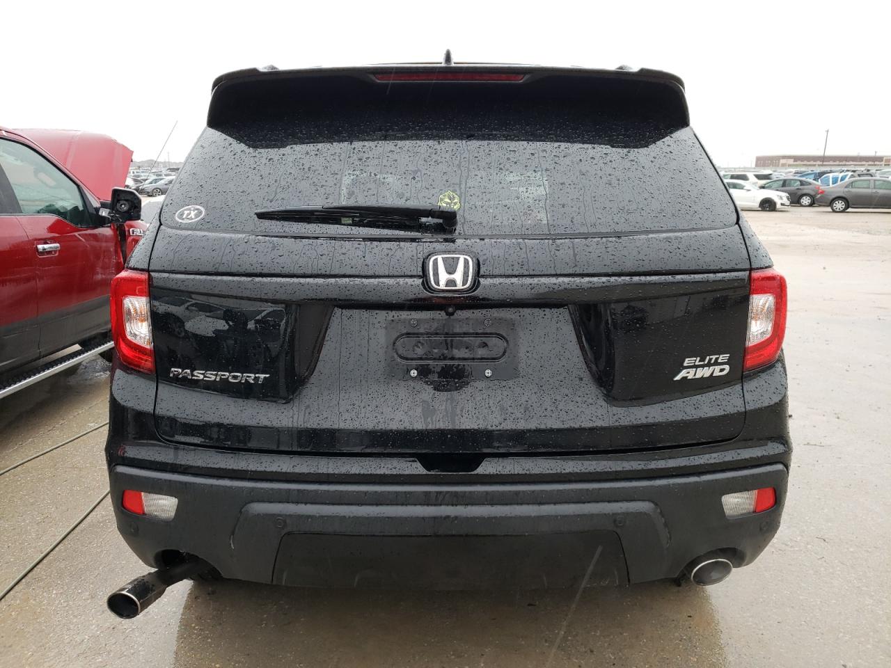 Photo 5 VIN: 5FNYF8H09KB014598 - HONDA PASSPORT 