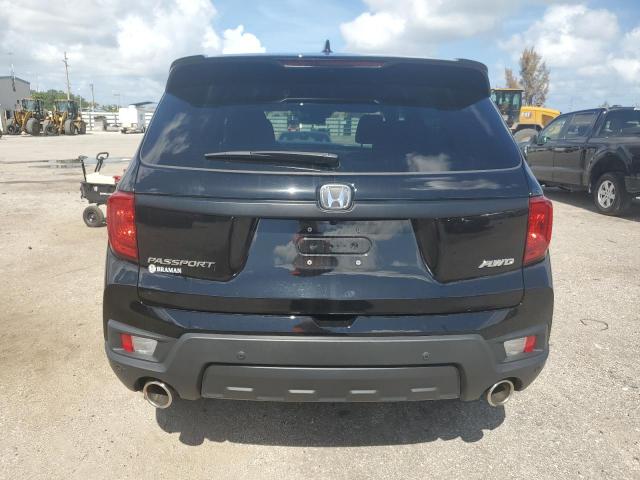 Photo 5 VIN: 5FNYF8H54PB021378 - HONDA PASSPORT E 