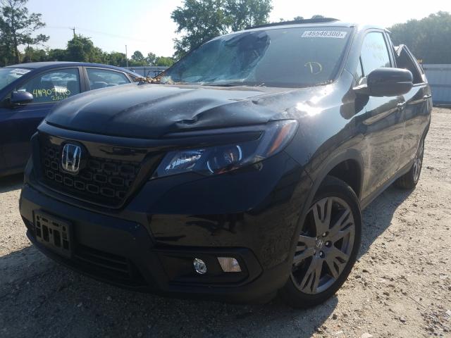 Photo 1 VIN: 5FNYF8H55KB028607 - HONDA PASSPORT E 