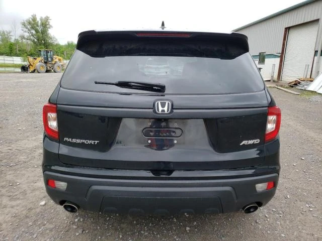 Photo 5 VIN: 5FNYF8H56KB010570 - HONDA PASSPORT E 