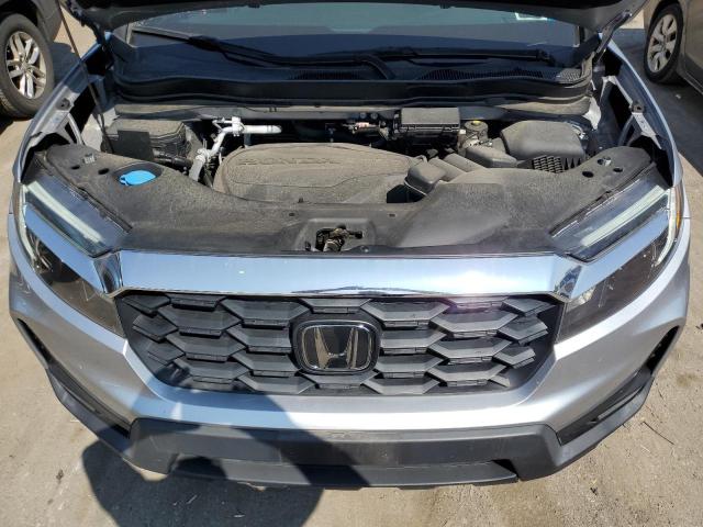 Photo 11 VIN: 5FNYF8H56NB001906 - HONDA PASSPORT E 