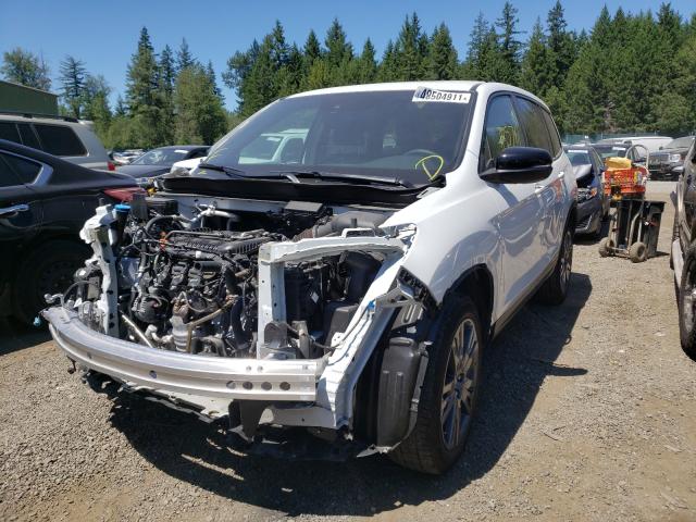 Photo 1 VIN: 5FNYF8H59LB012721 - HONDA PASSPORT E 