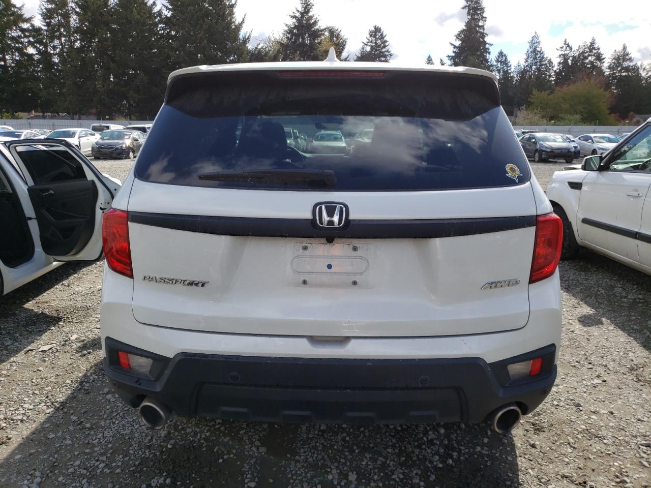 Photo 5 VIN: 5FNYF8H59NB020191 - HONDA PASSPORT 