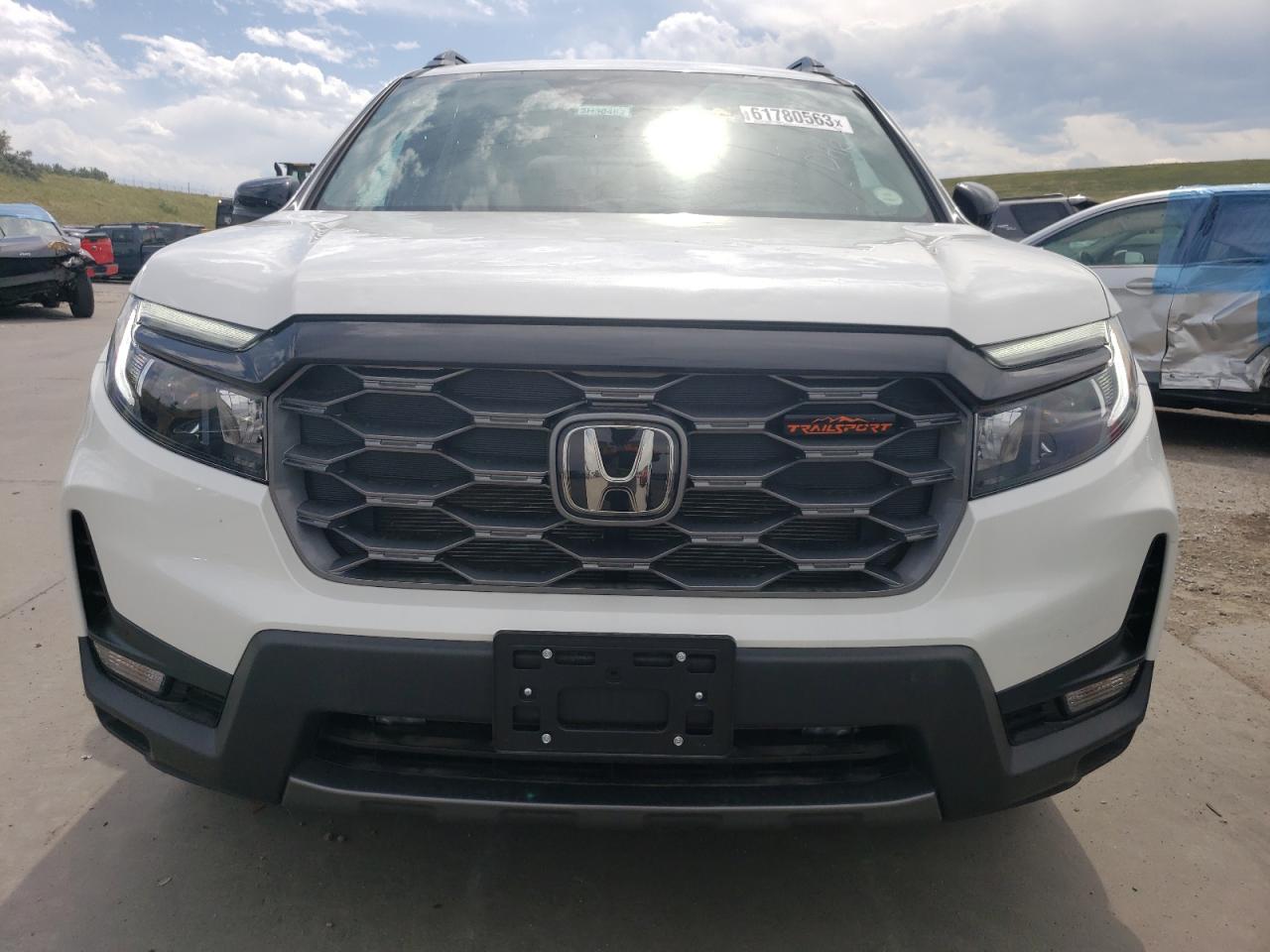 Photo 4 VIN: 5FNYF8H61PB013652 - HONDA PASSPORT 