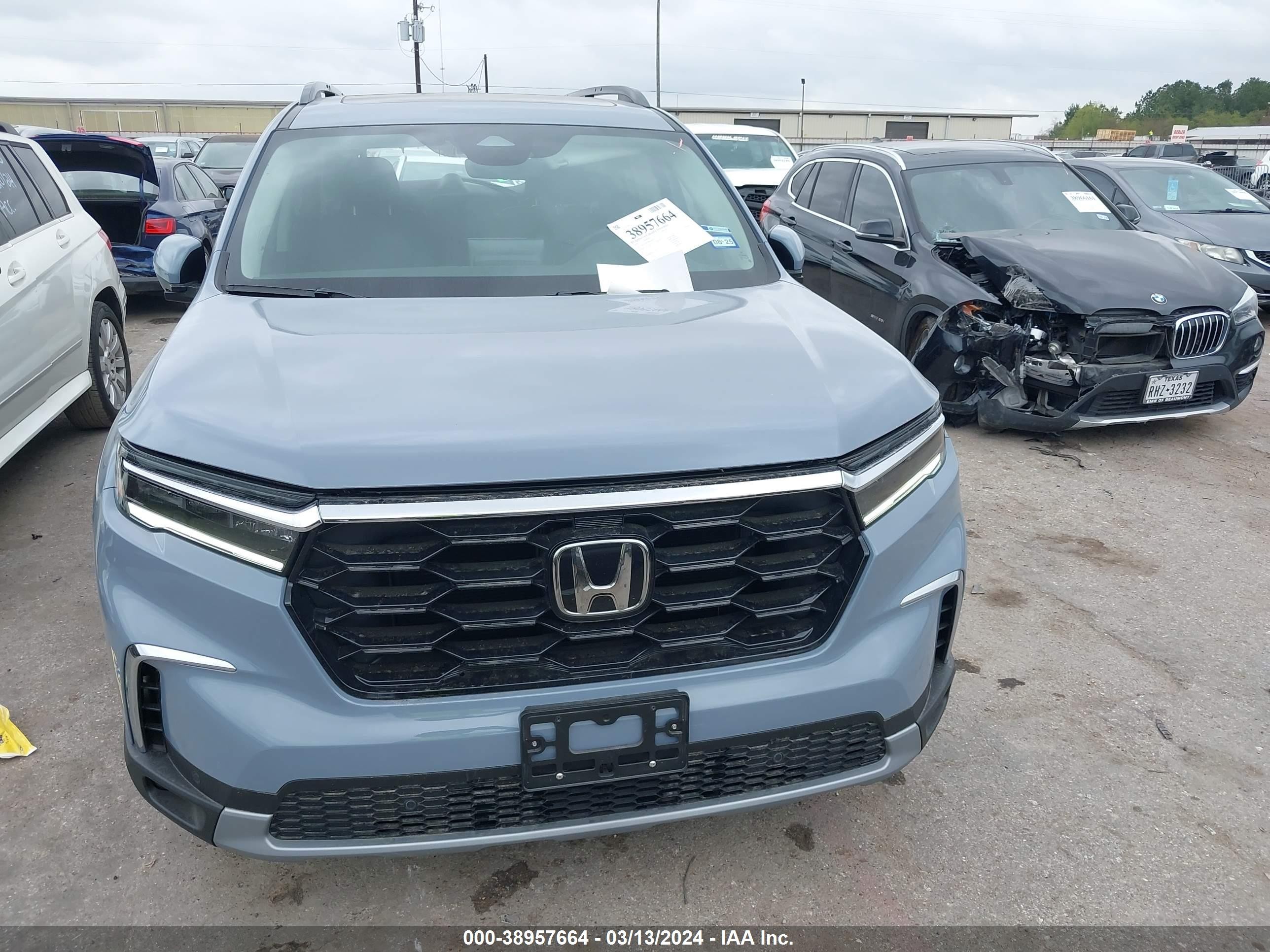 Photo 12 VIN: 5FNYG2H70PB014634 - HONDA PILOT 