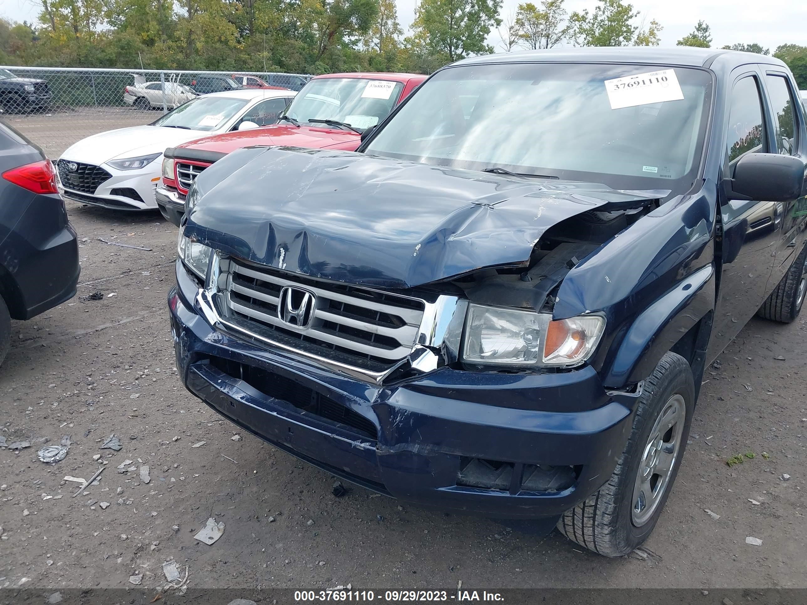 Photo 5 VIN: 5FPYK1F28CB457194 - HONDA RIDGELINE 