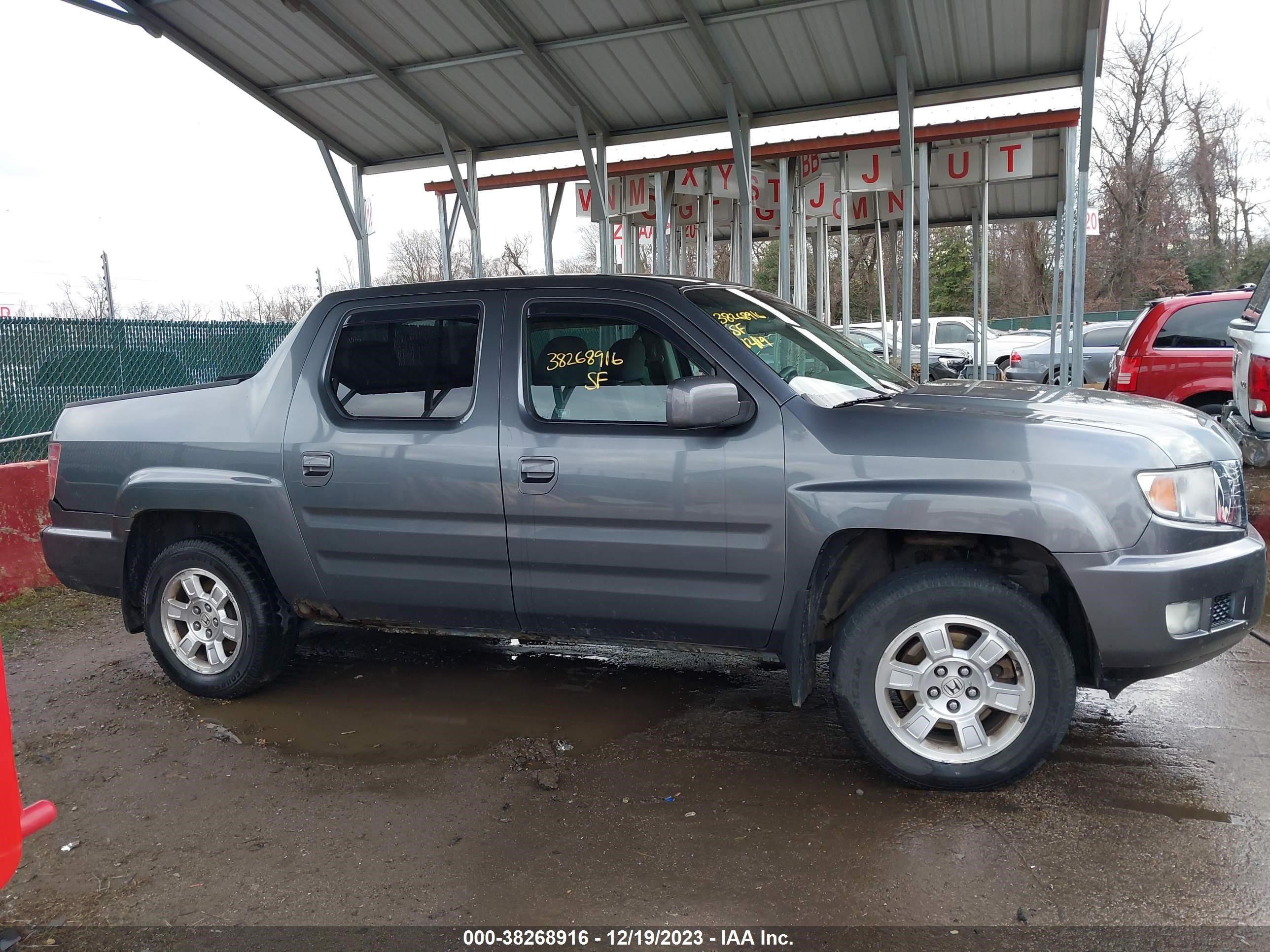 Photo 12 VIN: 5FPYK1F41AB005716 - HONDA RIDGELINE 