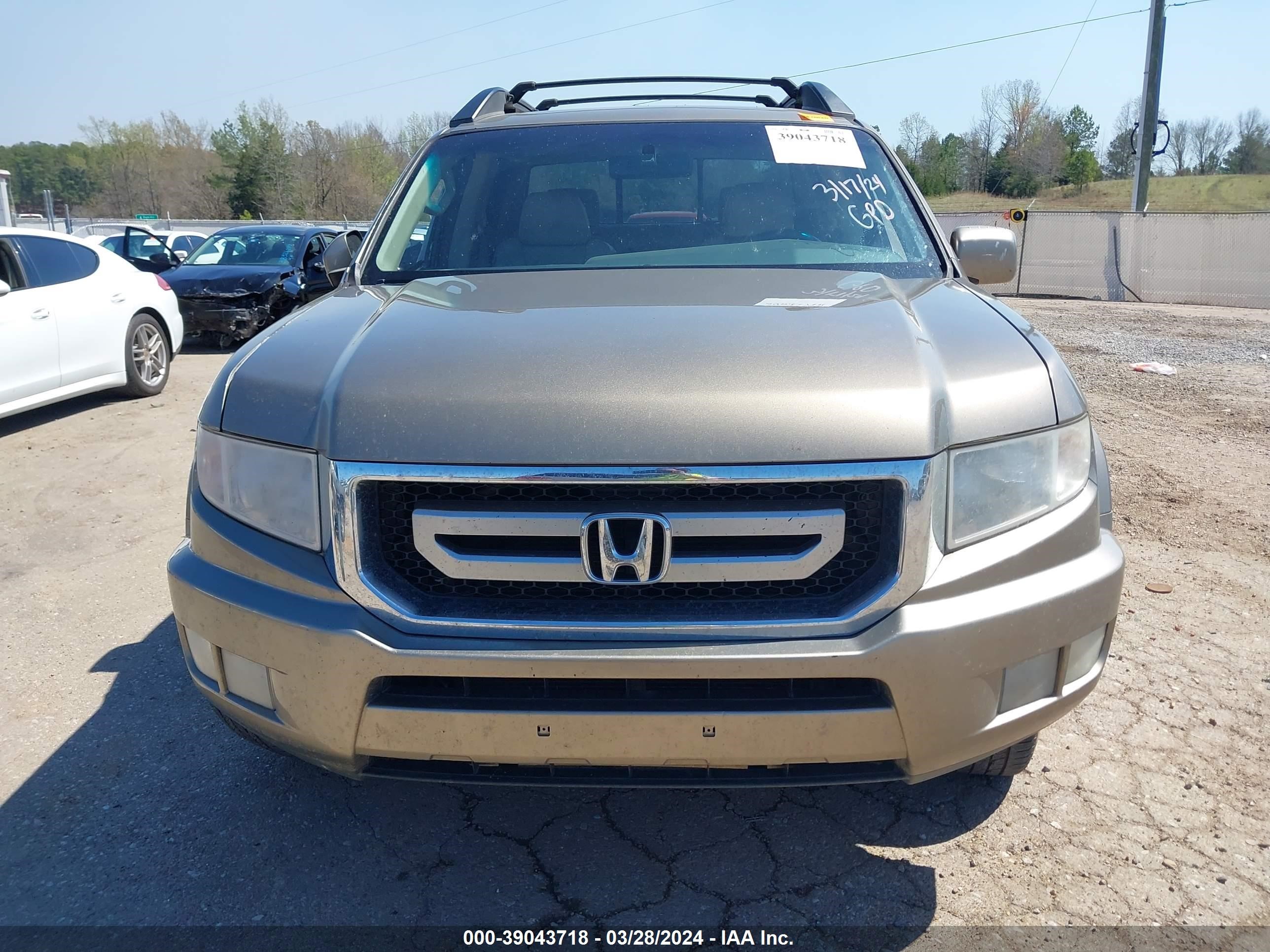 Photo 11 VIN: 5FPYK1F52BB008957 - HONDA RIDGELINE 