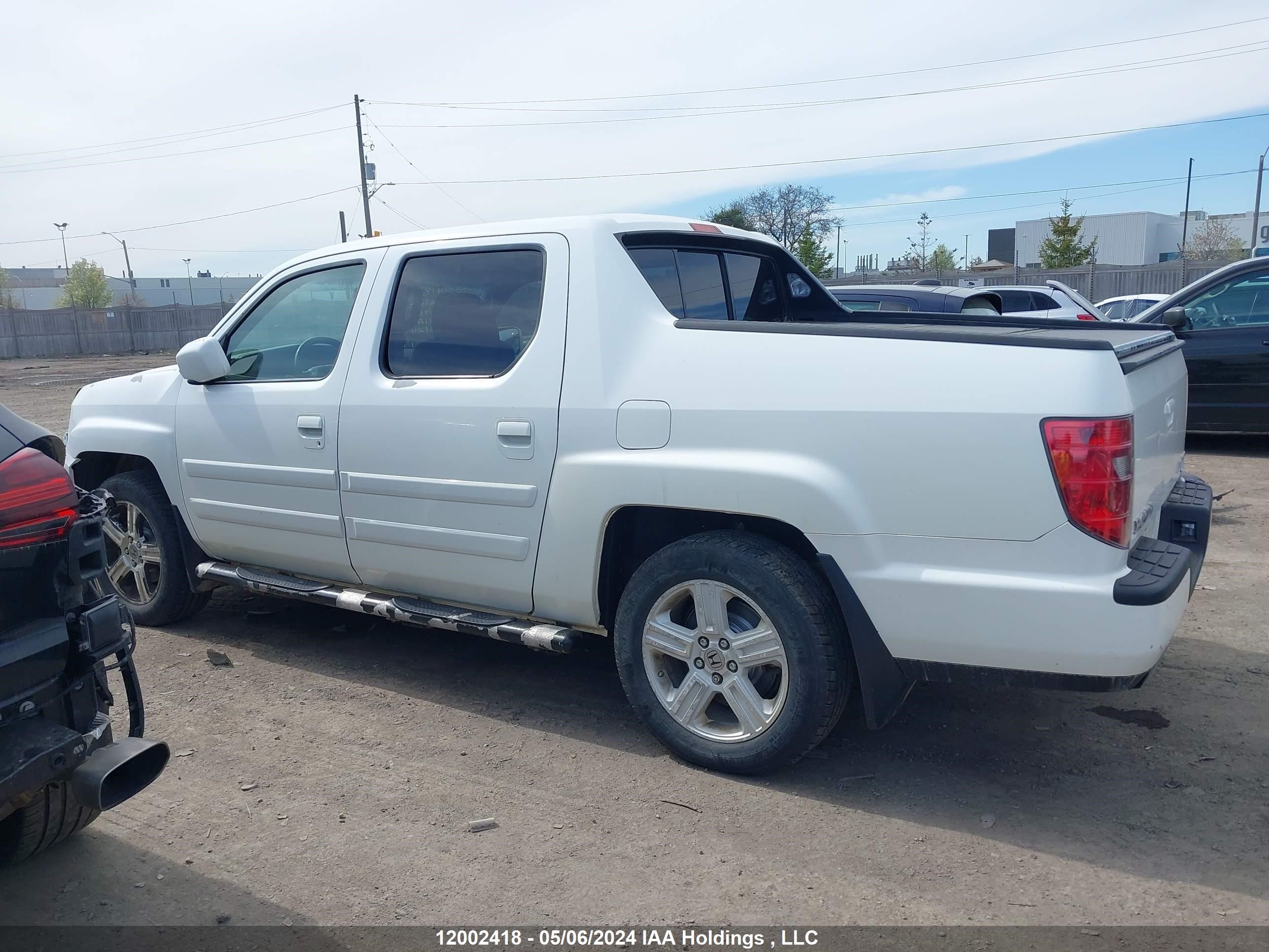 Photo 14 VIN: 5FPYK1F58BB501963 - HONDA RIDGELINE 