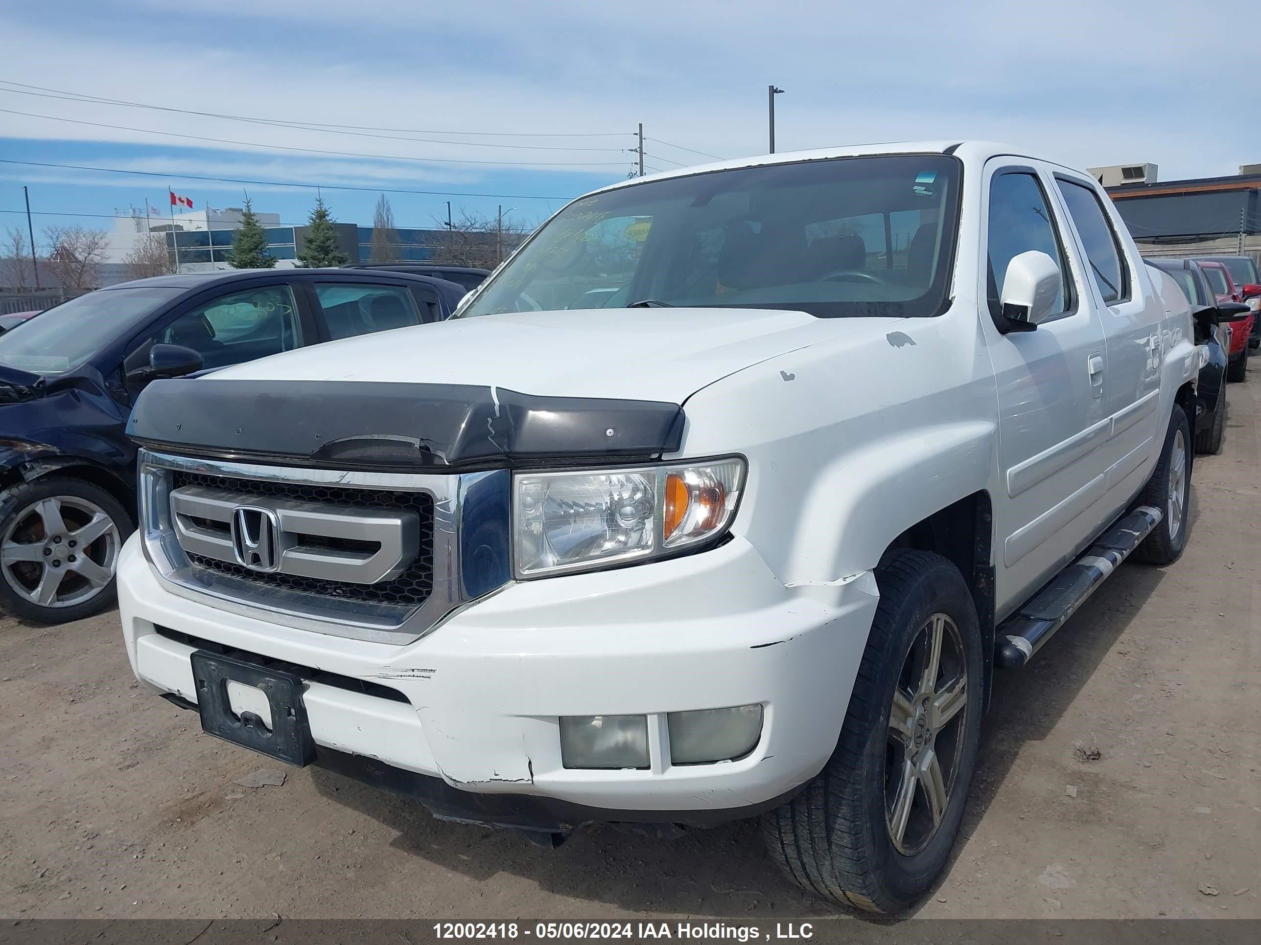 Photo 5 VIN: 5FPYK1F58BB501963 - HONDA RIDGELINE 