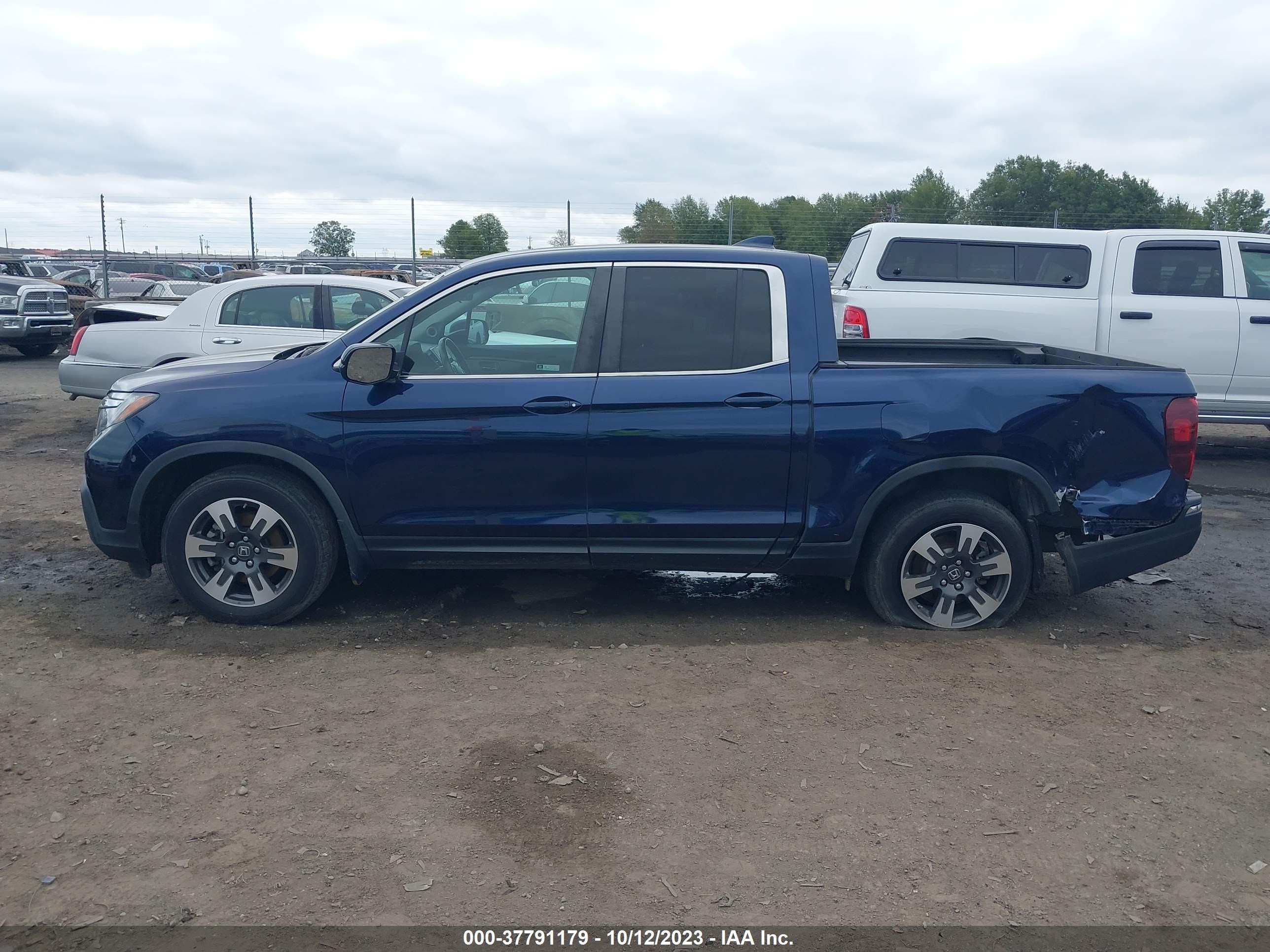 Photo 13 VIN: 5FPYK2F52KB007801 - HONDA RIDGELINE 