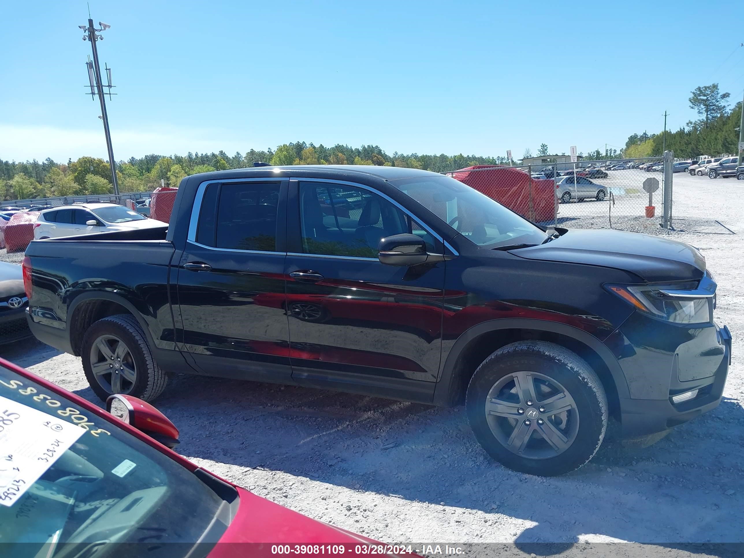 Photo 12 VIN: 5FPYK3F52PB001154 - HONDA RIDGELINE 