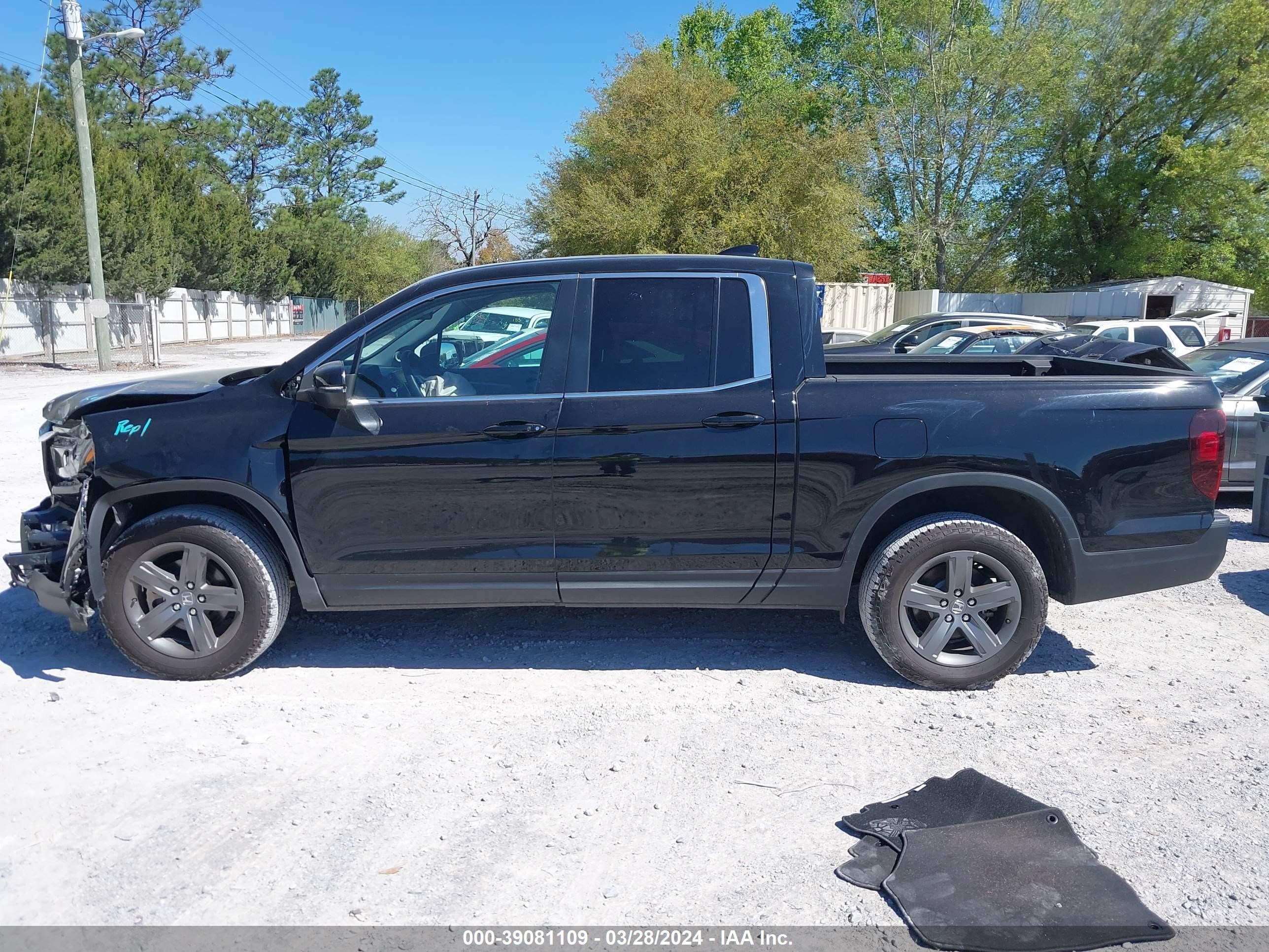 Photo 13 VIN: 5FPYK3F52PB001154 - HONDA RIDGELINE 