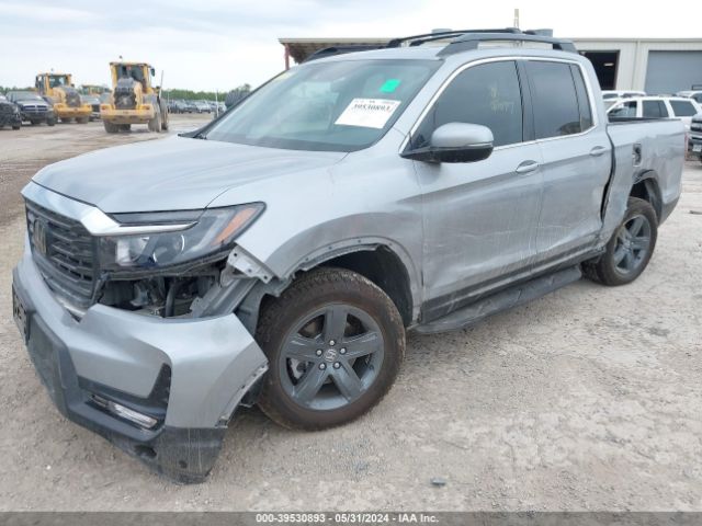 Photo 5 VIN: 5FPYK3F5XPB067077 - HONDA RIDGELINE 