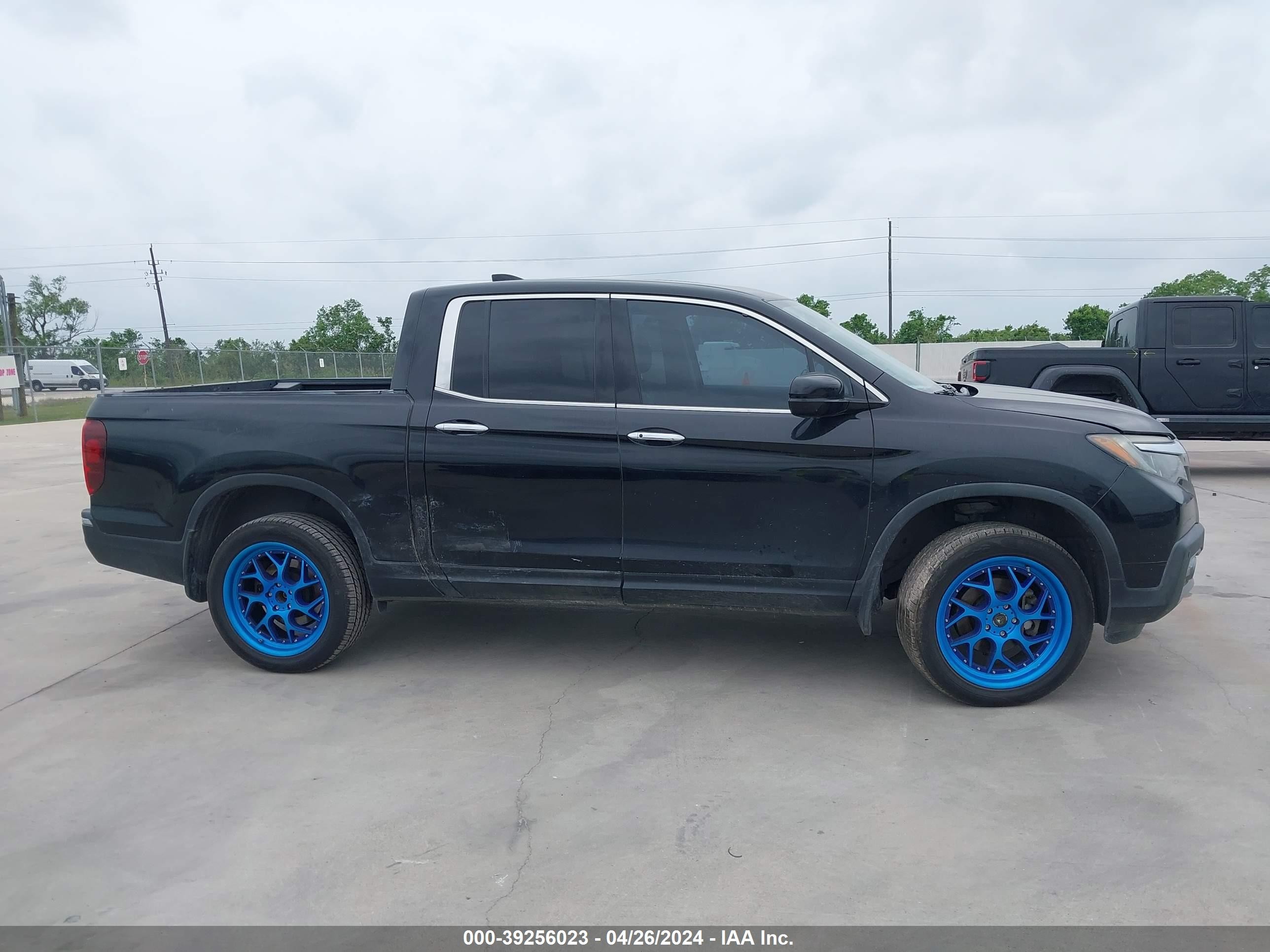 Photo 11 VIN: 5FPYK3F74KB004695 - HONDA RIDGELINE 