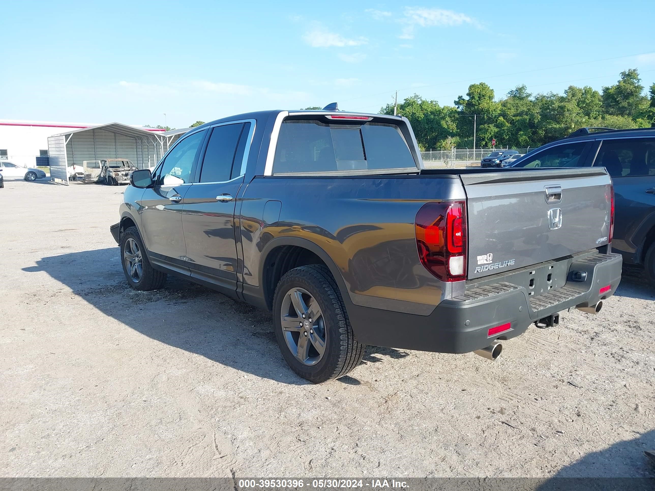 Photo 2 VIN: 5FPYK3F74PB059610 - HONDA RIDGELINE 