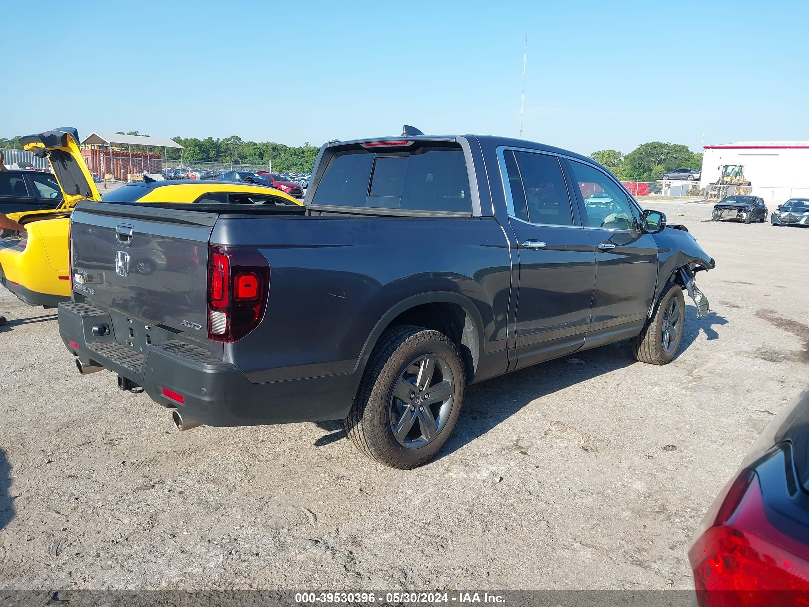 Photo 3 VIN: 5FPYK3F74PB059610 - HONDA RIDGELINE 