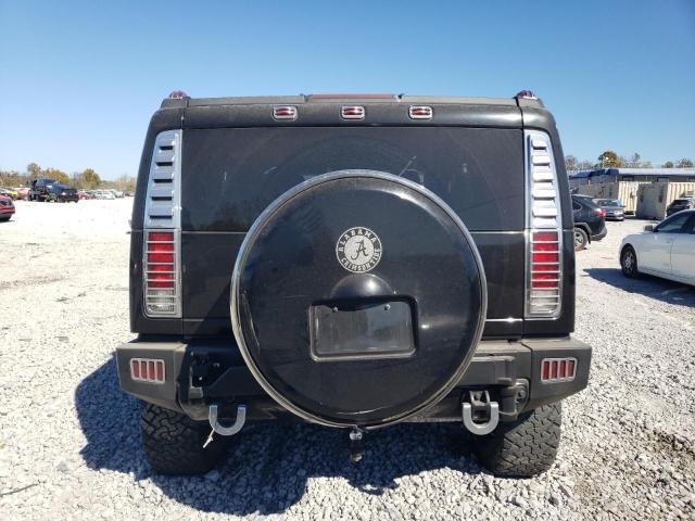 Photo 5 VIN: 5GRGN23848H100580 - HUMMER H2 