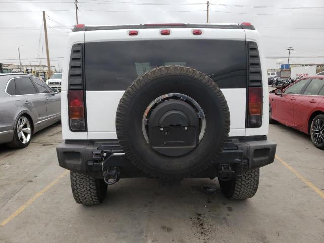 Photo 5 VIN: 5GRGN23U04H121322 - HUMMER H2 