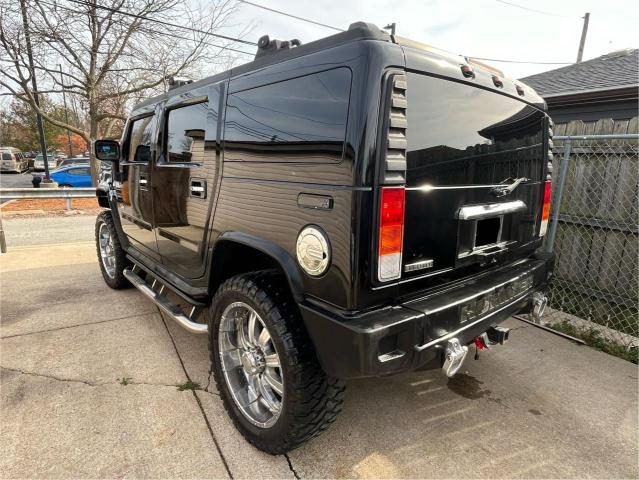 Photo 2 VIN: 5GRGN23U14H115951 - HUMMER H2 