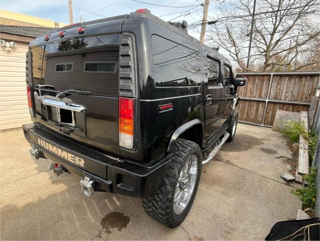 Photo 3 VIN: 5GRGN23U14H115951 - HUMMER H2 