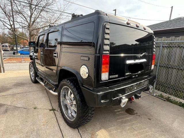 Photo 2 VIN: 5GRGN23U14H115951 - HUMMER H2 