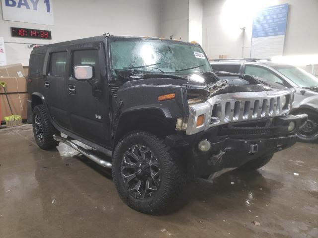 Photo 3 VIN: 5GRGN23U33H143023 - HUMMER H2 