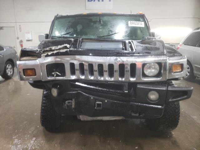 Photo 4 VIN: 5GRGN23U33H143023 - HUMMER H2 