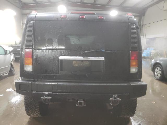 Photo 5 VIN: 5GRGN23U33H143023 - HUMMER H2 