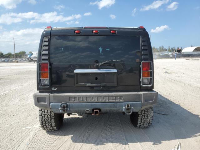 Photo 5 VIN: 5GRGN23U34H114736 - HUMMER H2 