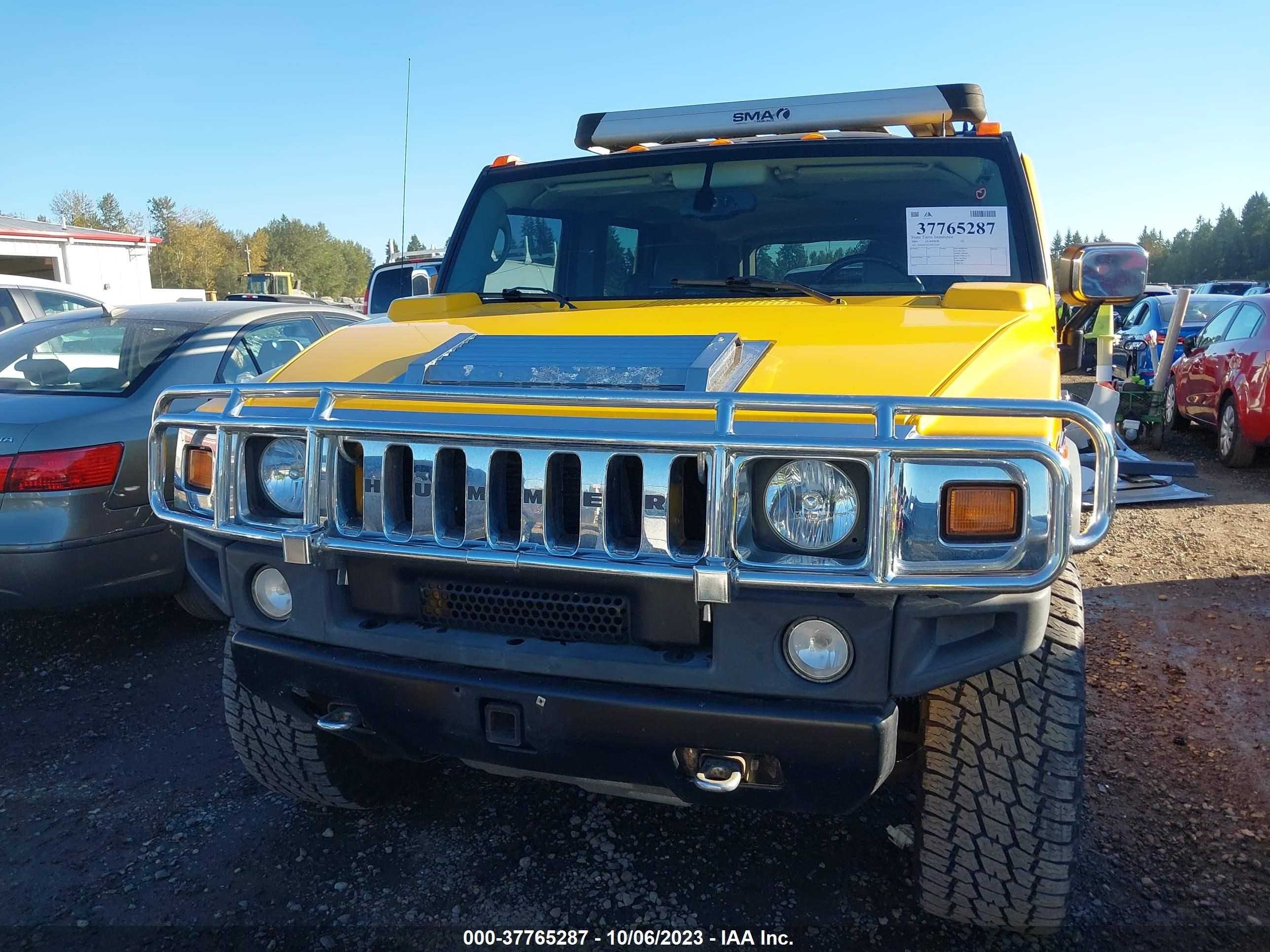 Photo 11 VIN: 5GRGN23U34H115210 - HUMMER H2 