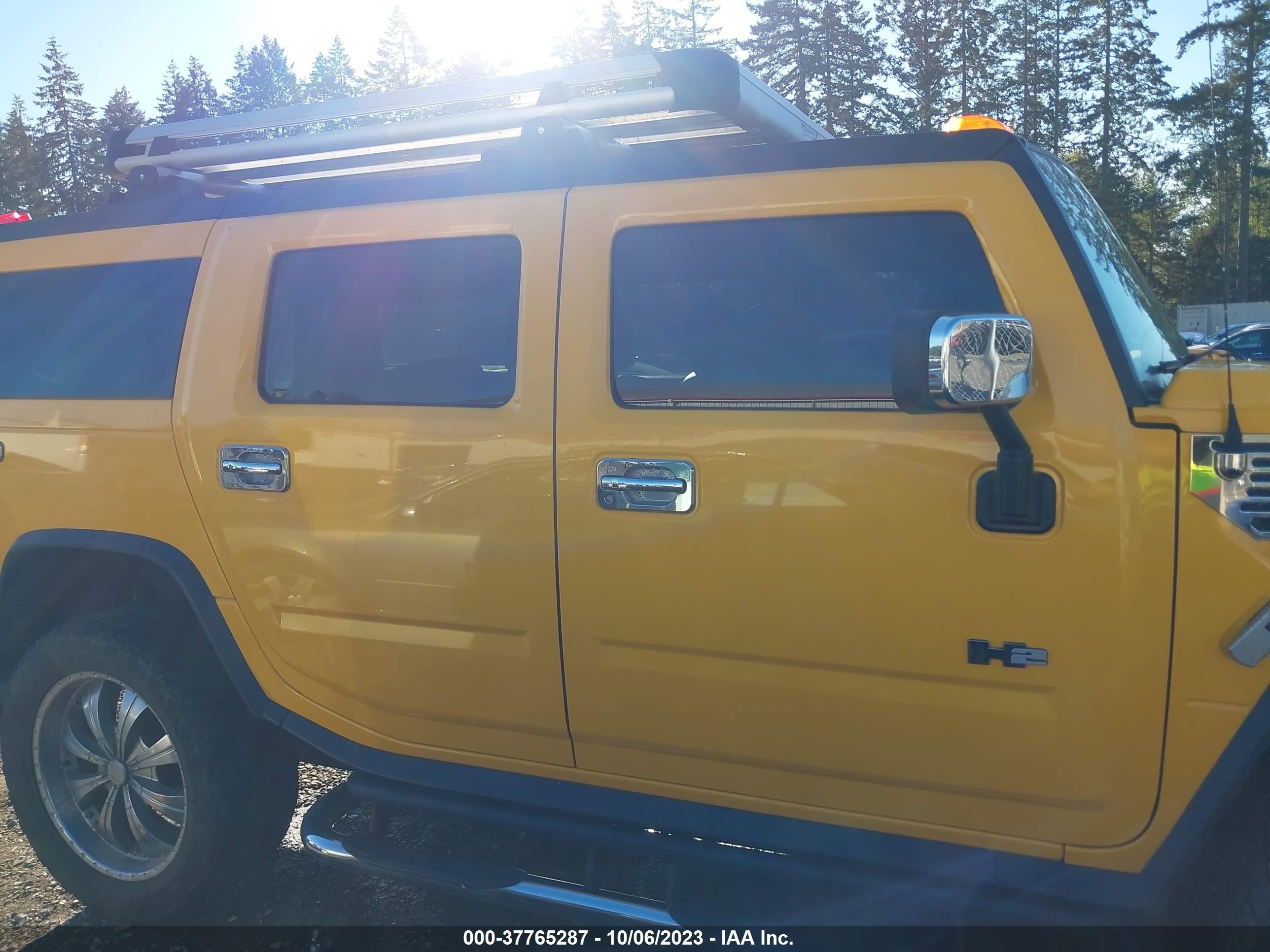 Photo 12 VIN: 5GRGN23U34H115210 - HUMMER H2 