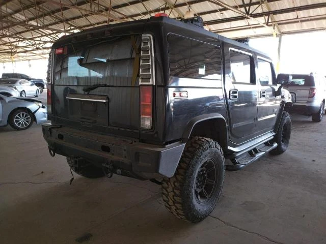 Photo 3 VIN: 5GRGN23U43H115554 - HUMMER H2 