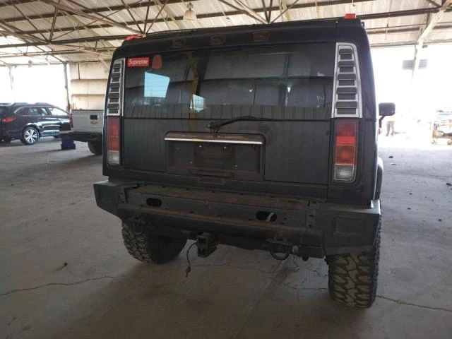 Photo 8 VIN: 5GRGN23U43H115554 - HUMMER H2 