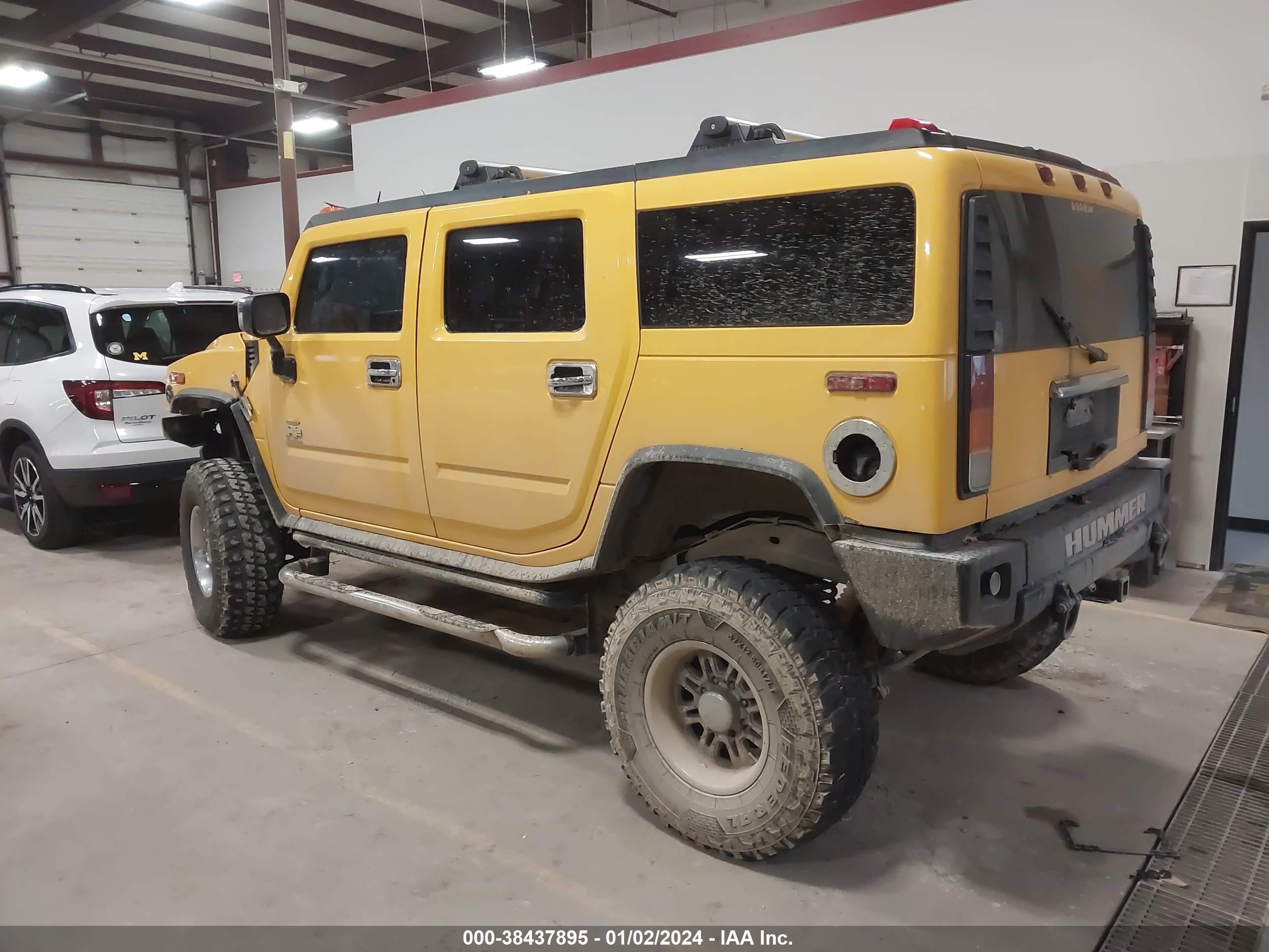 Photo 2 VIN: 5GRGN23U53H141743 - HUMMER H2 