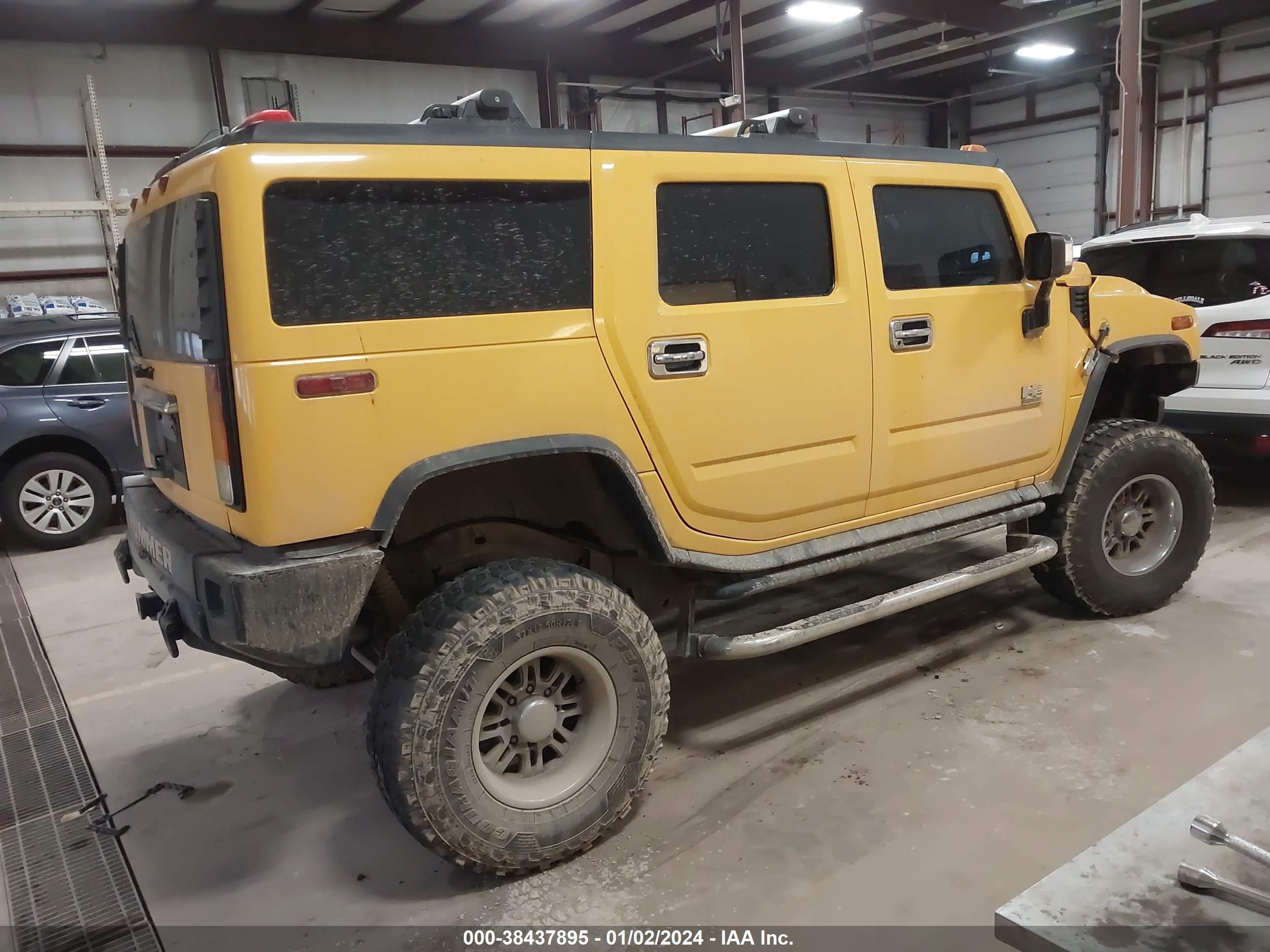 Photo 3 VIN: 5GRGN23U53H141743 - HUMMER H2 