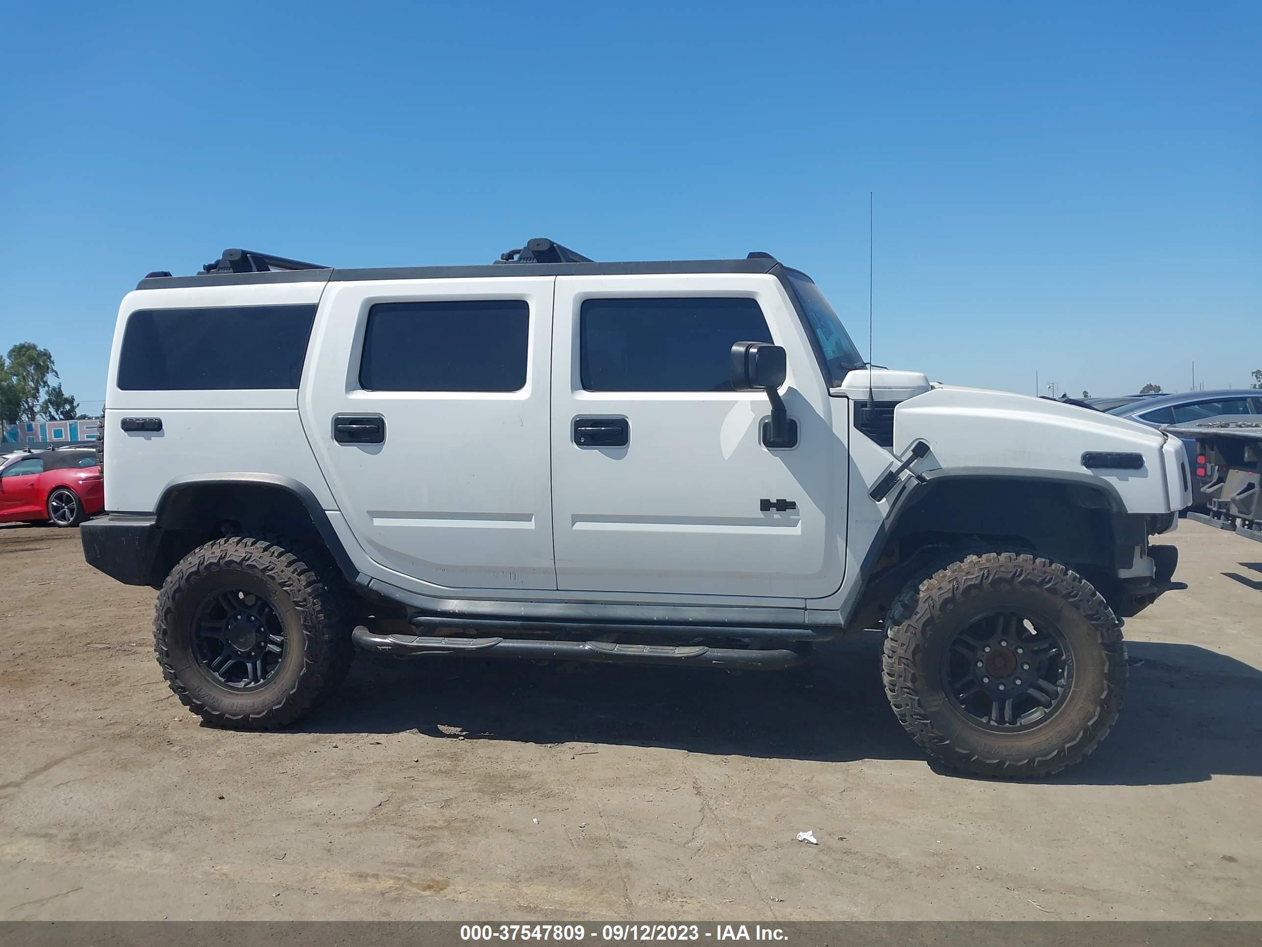 Photo 11 VIN: 5GRGN23U65H132522 - HUMMER H2 