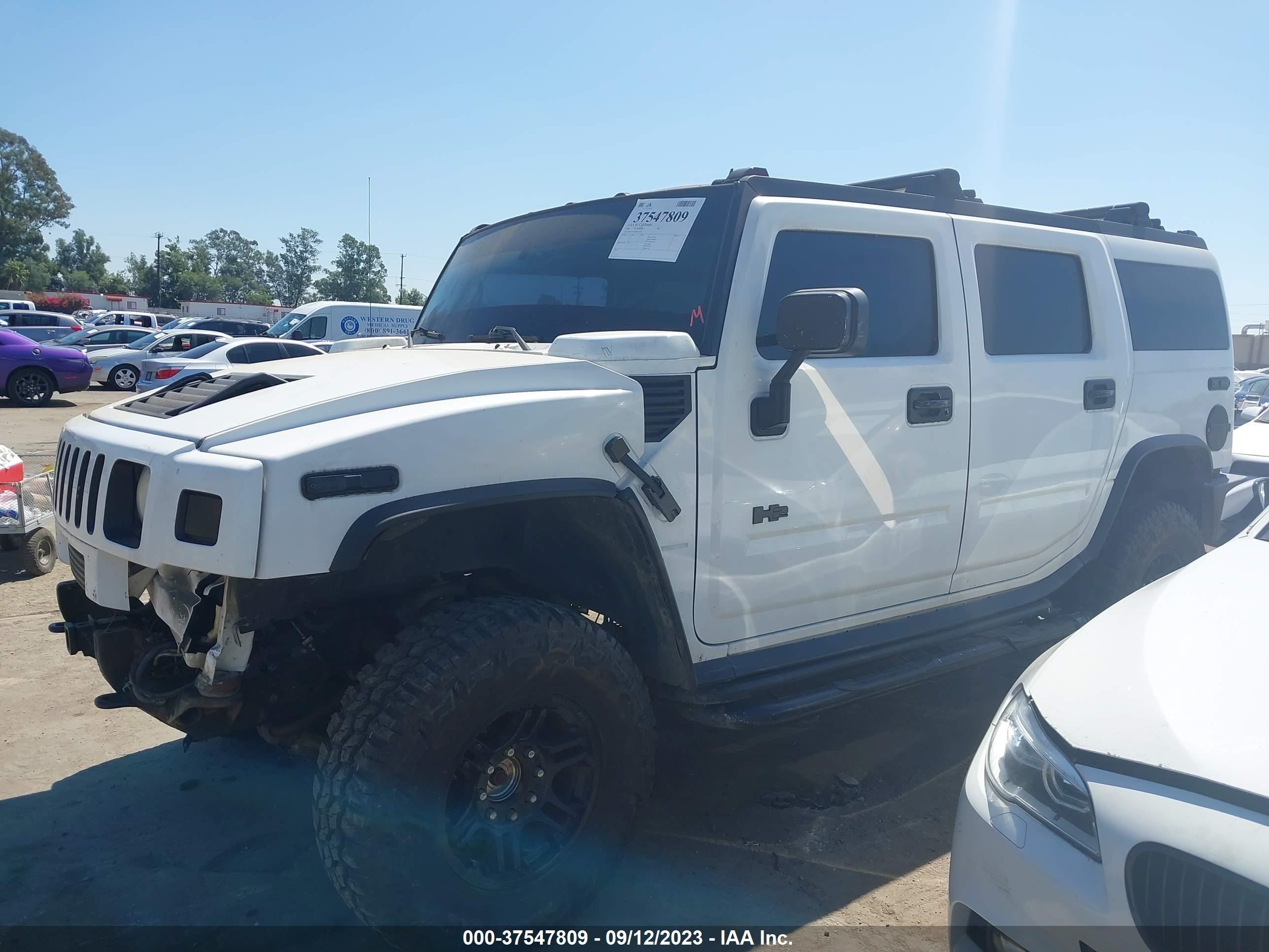 Photo 12 VIN: 5GRGN23U65H132522 - HUMMER H2 