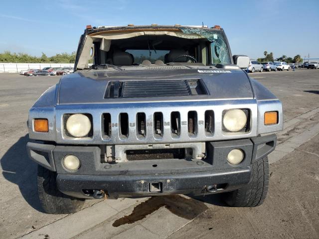 Photo 4 VIN: 5GRGN23U73H126113 - HUMMER H2 