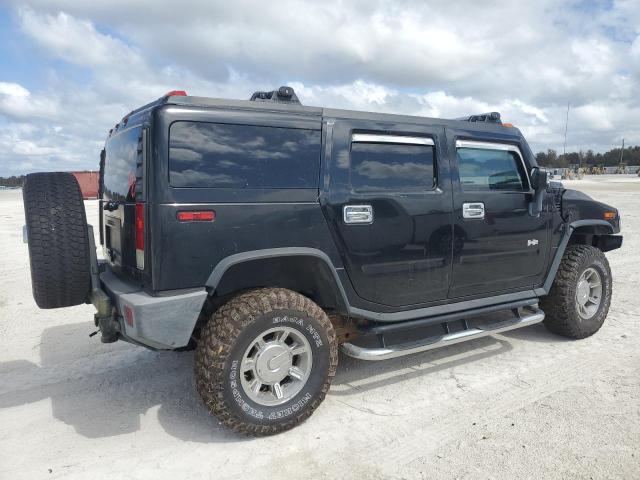 Photo 2 VIN: 5GRGN23U77H103677 - HUMMER H2 