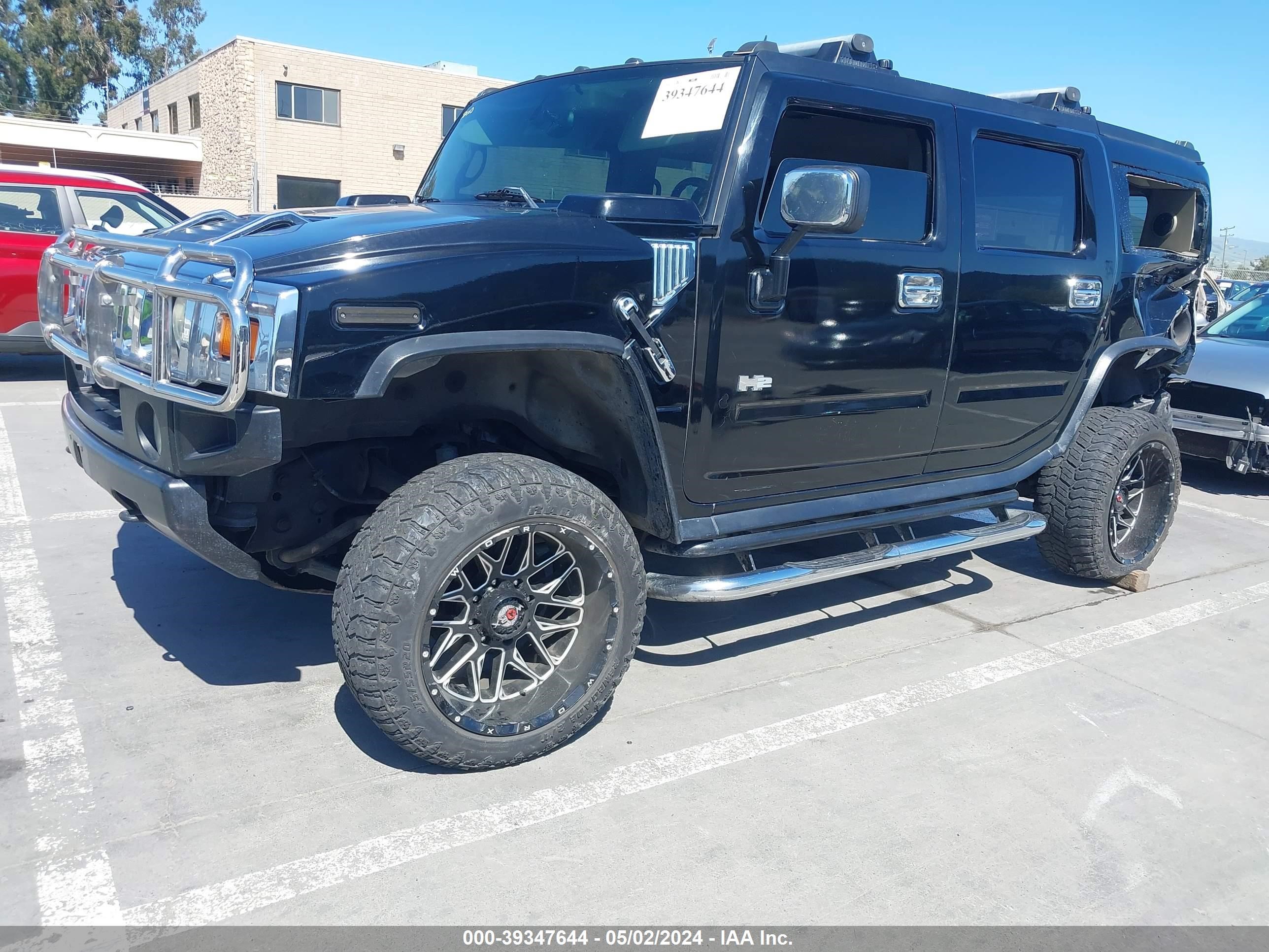 Photo 1 VIN: 5GRGN23UX3H131404 - HUMMER H2 